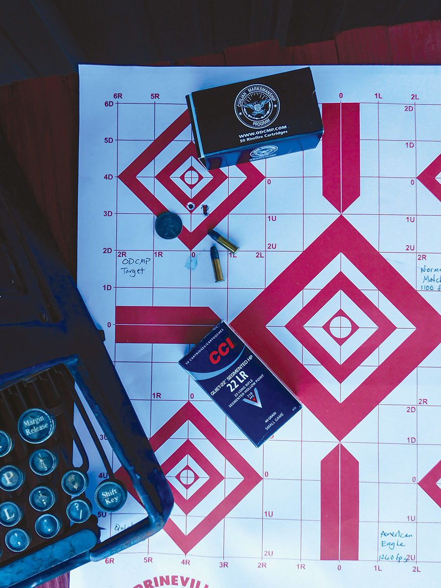 This three-shot group (upper left) with two holes touching demonstrated the accuracy of the long-barreled Marlin at 50 yards.